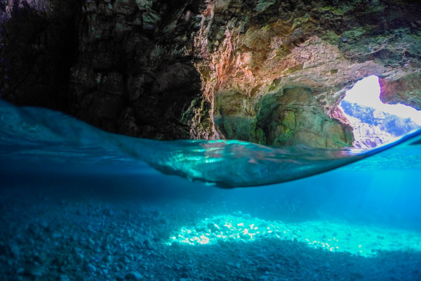 Grama Bay & Secret Blue Cave Boat Tour