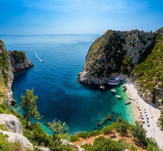 Full day boat trip to Grama Bay, Dafina Cave, and Blue Cave with Boat Trips to Paradise